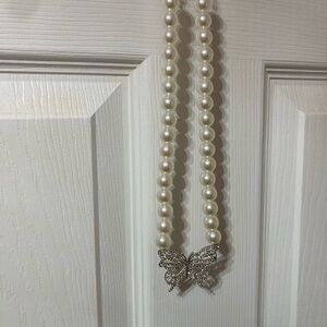 Elegant Pearl Necklace with Butterfly Pendant